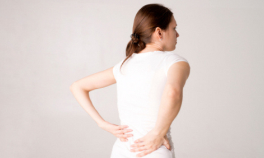 Girl with lower back pain